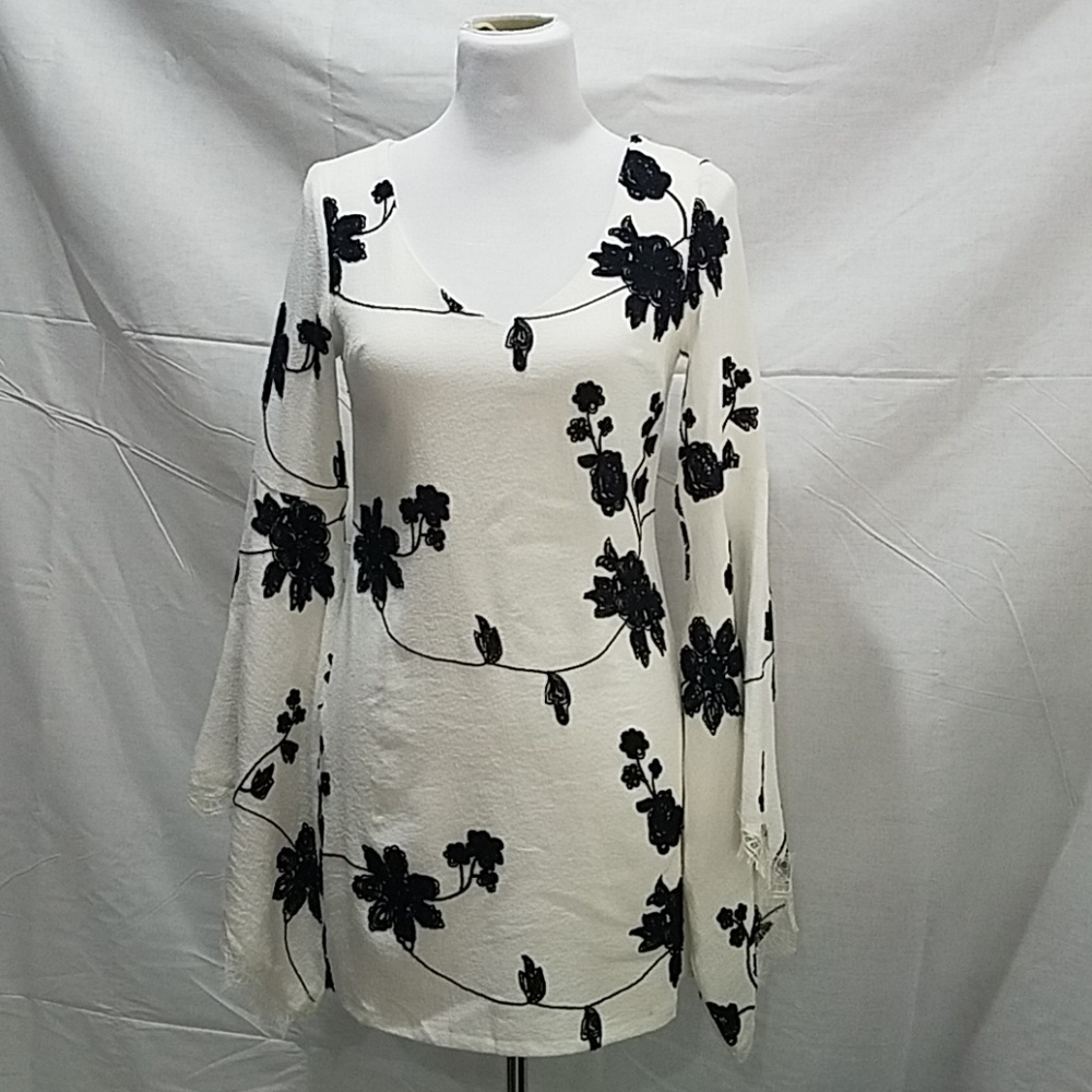 White dress with black flowers